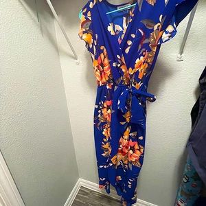 Gorgeous spring/summer dress with side wrap.